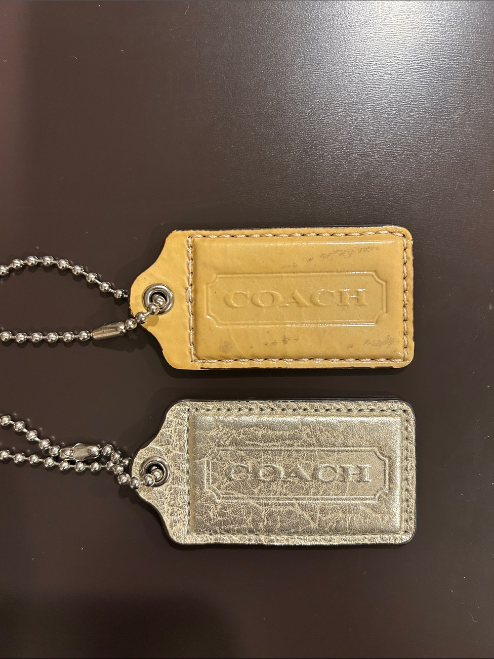 Coach Platinum or Taupe Yellow  3” Embossed Leather HangTag- Choice